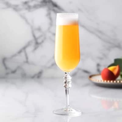 Кремовый Беллини (персиковое пюре, сироп крем-сода, лимон, игристое)